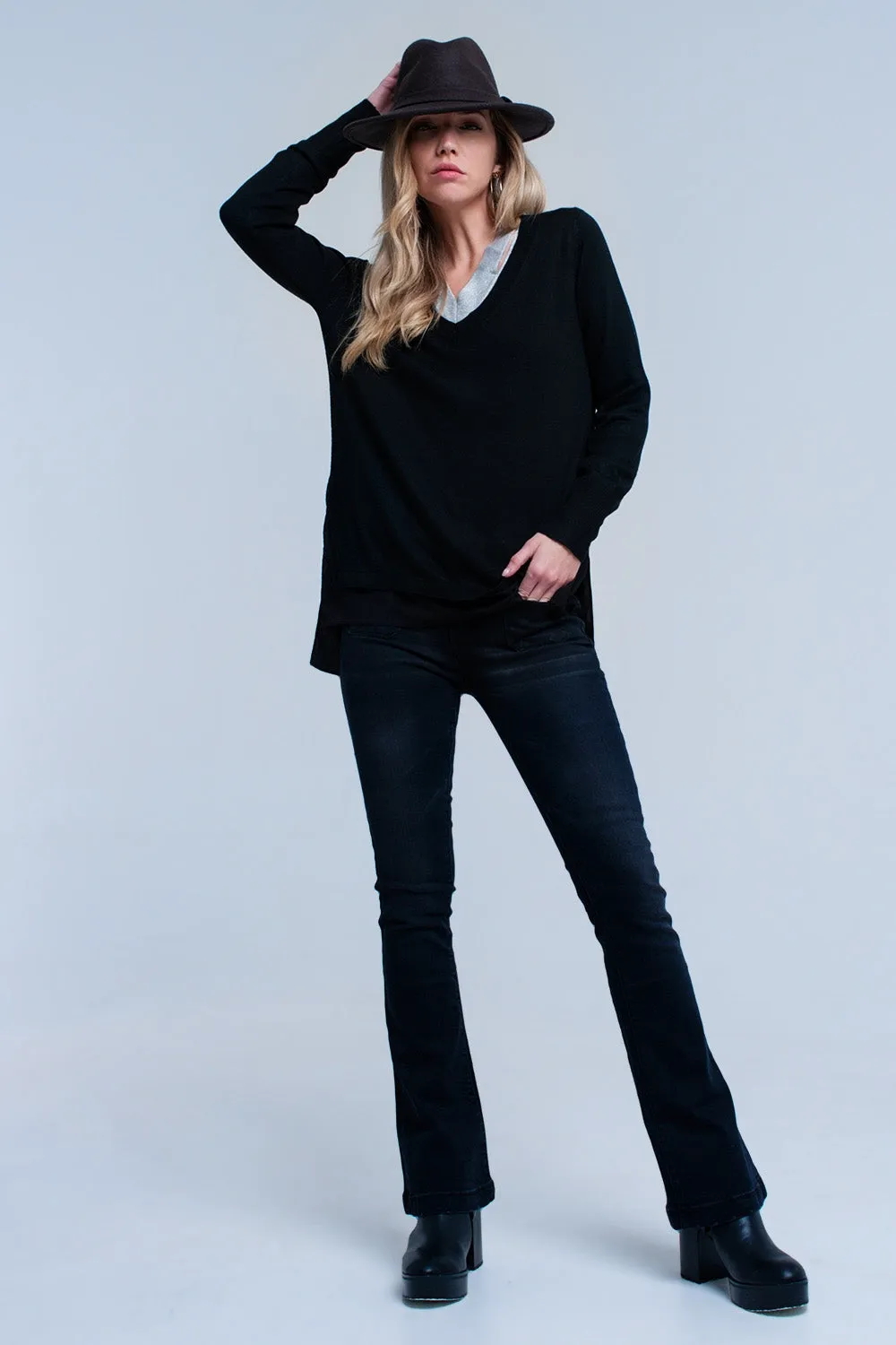 Black ribbed V-neck sweater